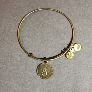 Gold Alex & Ani bracelet w/ “S” monogram pendant